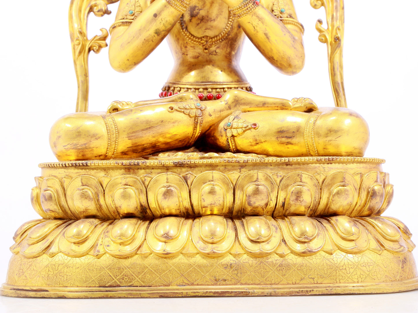 A gilt bronze statue of Tara inlaid with hundreds of treasures