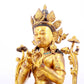 A gilt bronze statue of Tara inlaid with hundreds of treasures