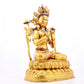 A gilt bronze statue of Tara inlaid with hundreds of treasures