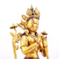 A gilt bronze statue of Tara inlaid with hundreds of treasures