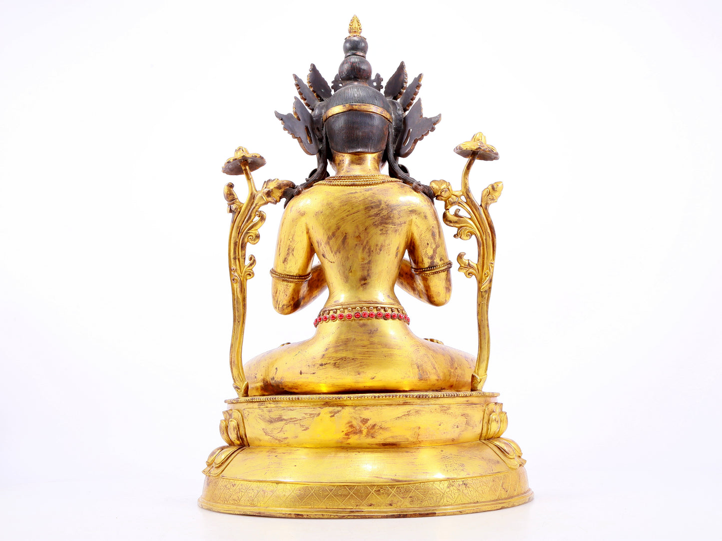 A gilt bronze statue of Tara inlaid with hundreds of treasures