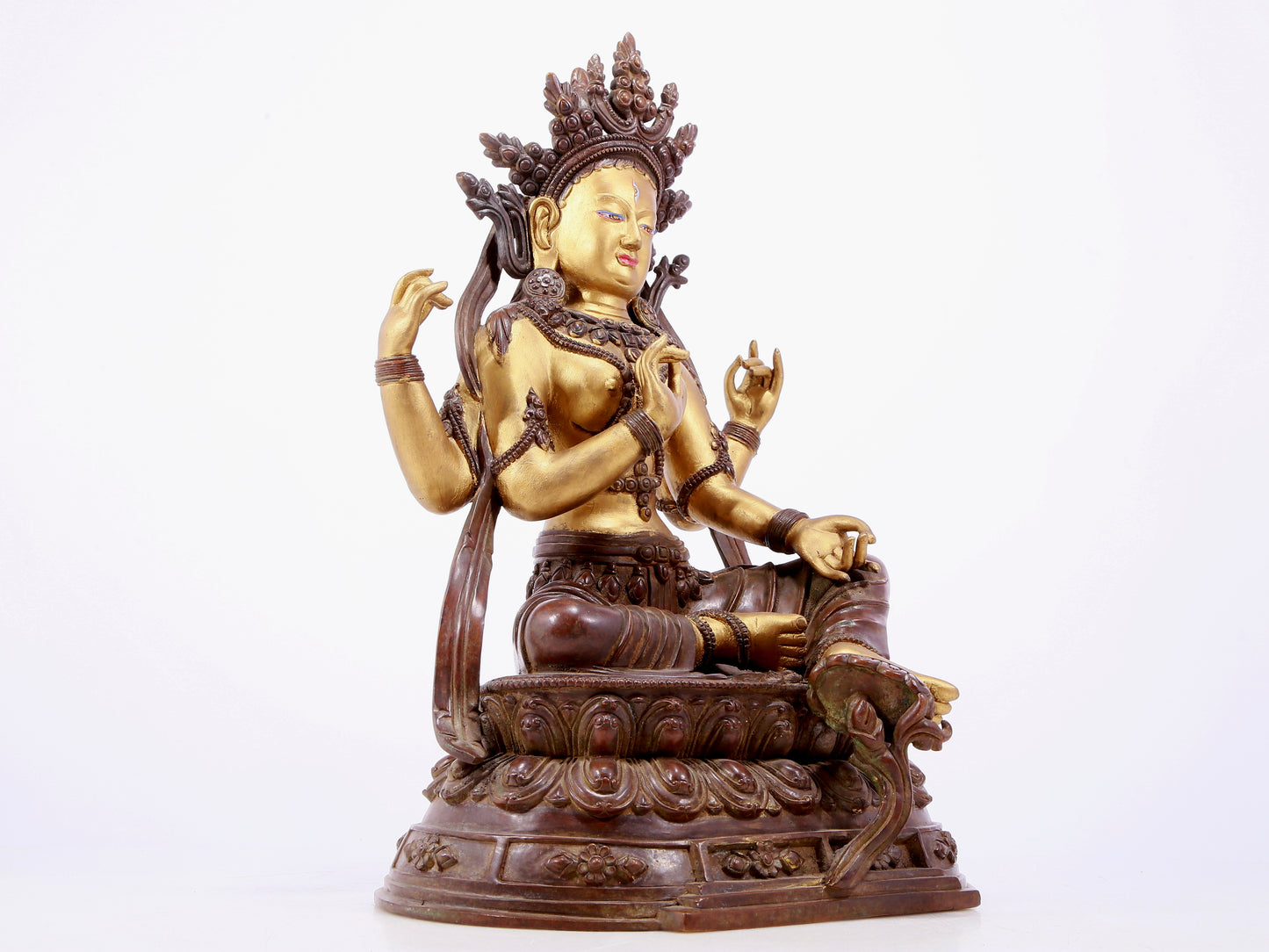 An Archaic Gilt-Bronze Figure Of Four-Armed Avalokiteshvara