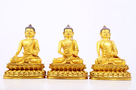 Three gilt bronze statues of Sakyamuni