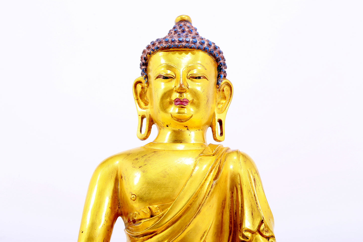 Three gilt bronze statues of Sakyamuni