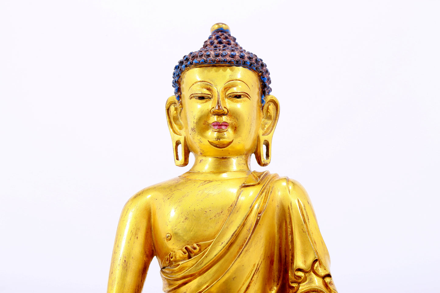 Three gilt bronze statues of Sakyamuni