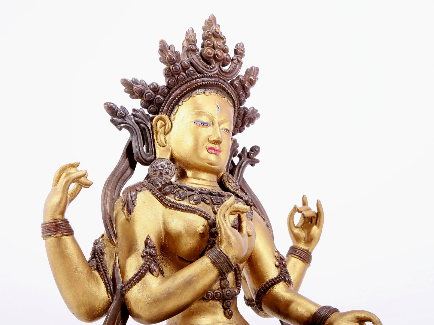 An Archaic Gilt-Bronze Figure Of Four-Armed Avalokiteshvara