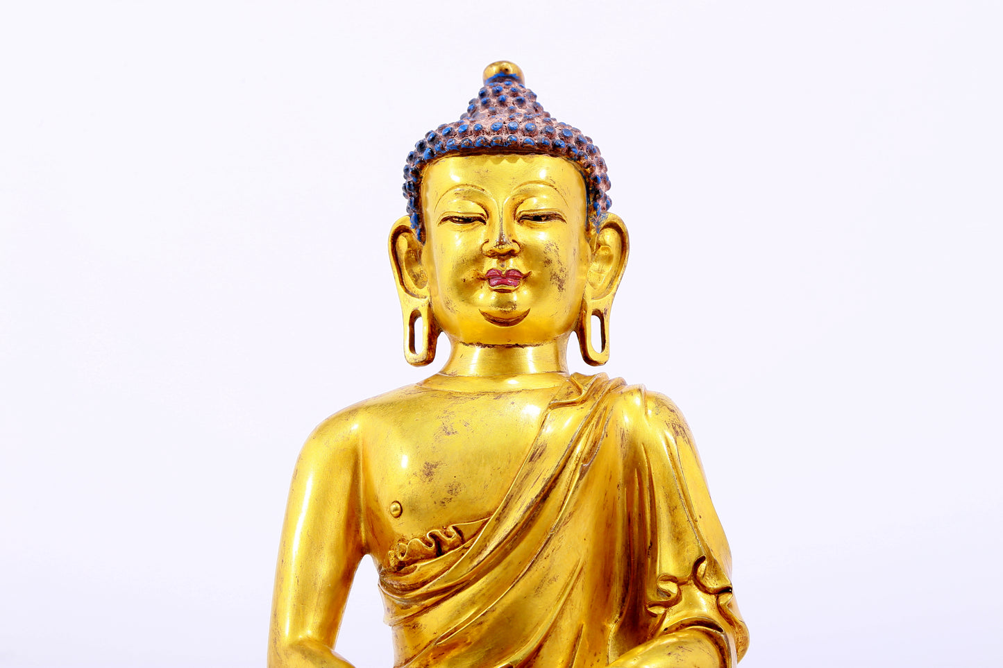 Three gilt bronze statues of Sakyamuni