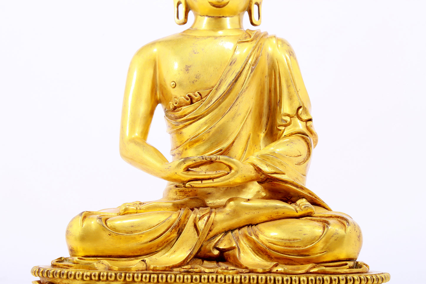 Three gilt bronze statues of Sakyamuni