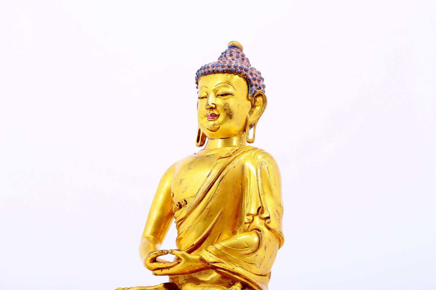 Three gilt bronze statues of Sakyamuni