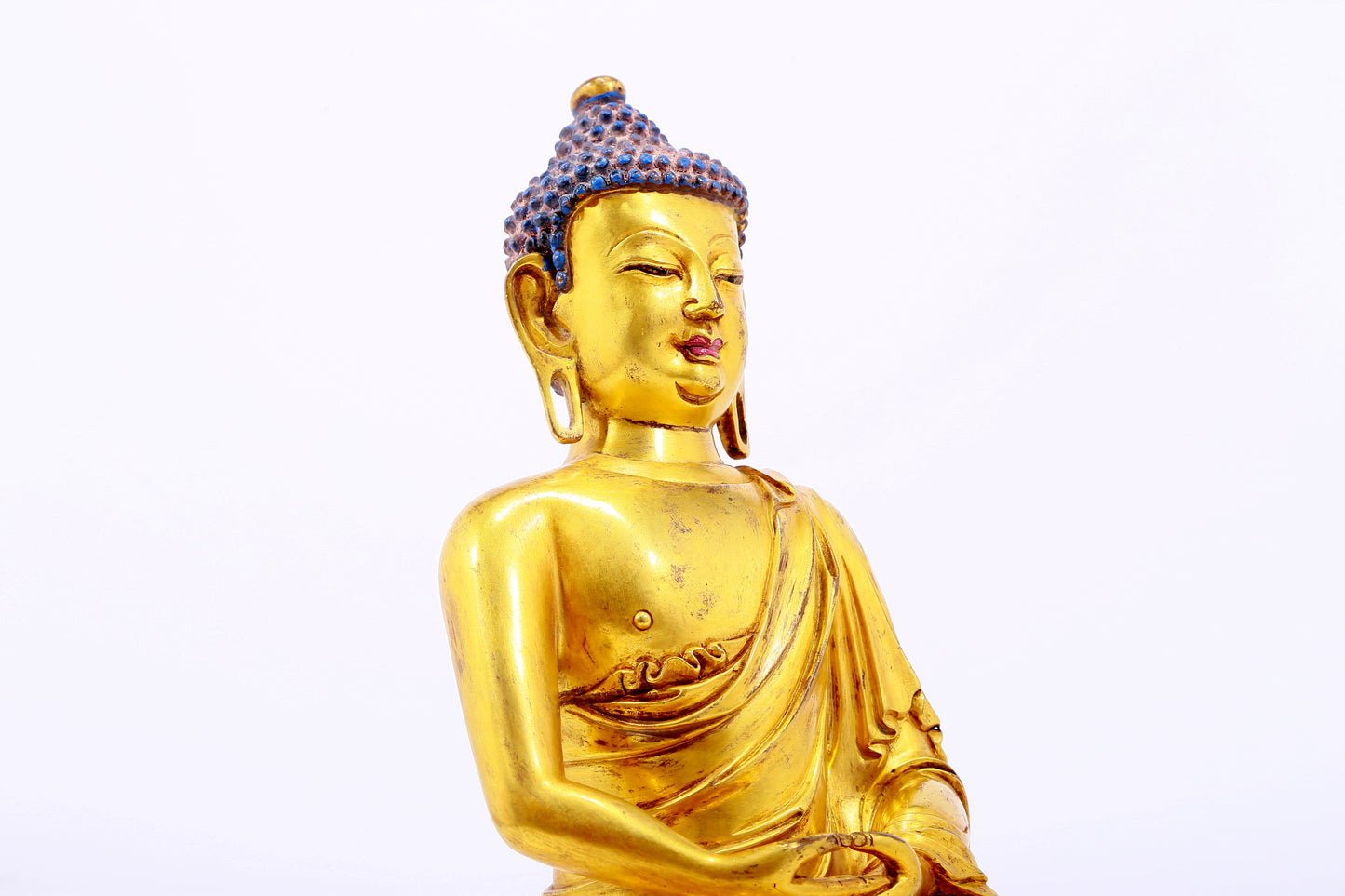 Three gilt bronze statues of Sakyamuni