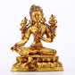 A serene gilt bronze green Tara statue