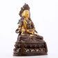 A serene gilt bronze statue of Amitayus Buddha