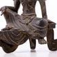 A serene gilt bronze statue of Guanyin