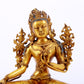 A serene gilt bronze green Tara statue