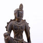 A serene gilt bronze statue of Guanyin