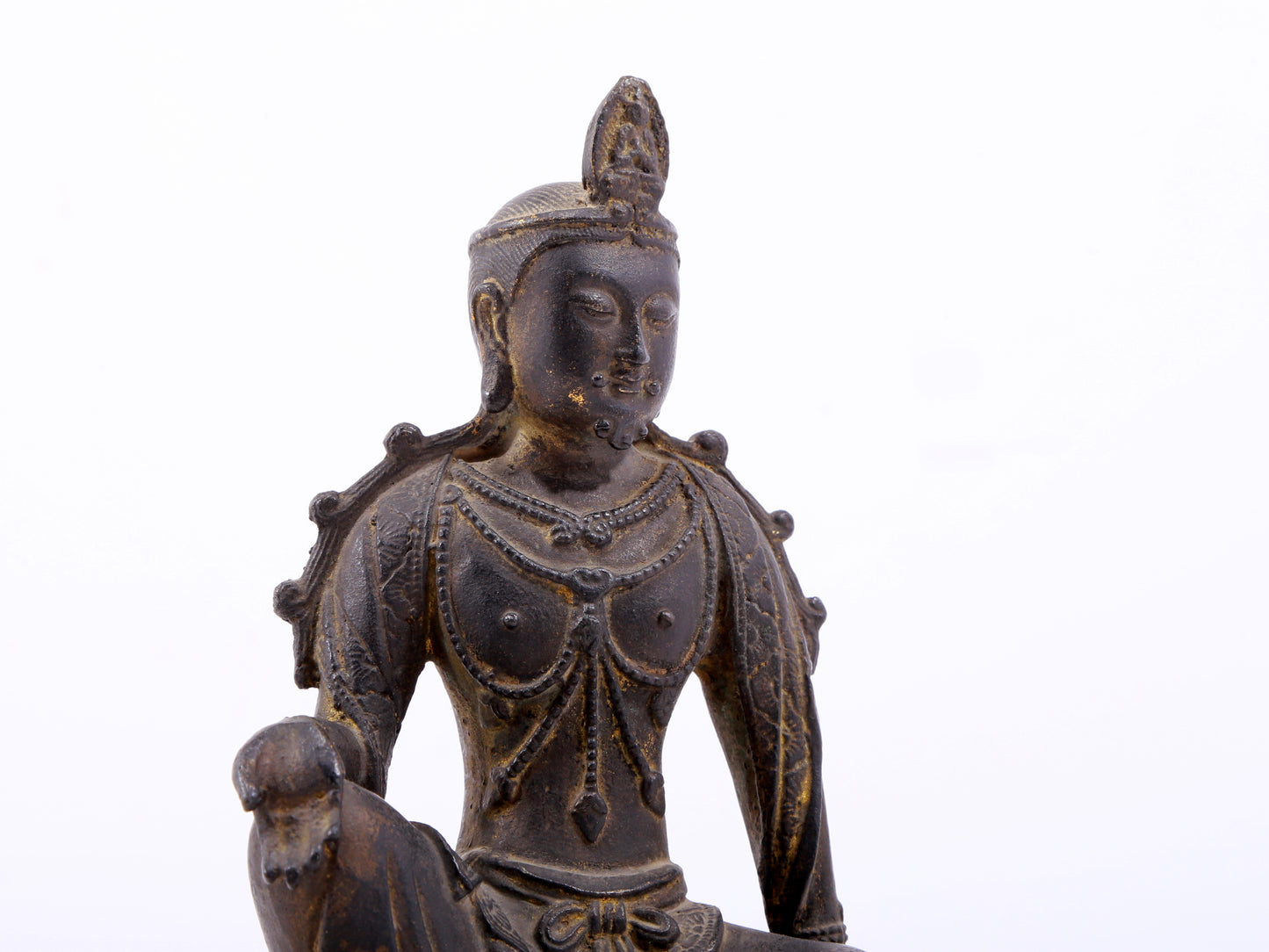 A serene gilt bronze statue of Guanyin