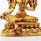 A serene gilt bronze green Tara statue