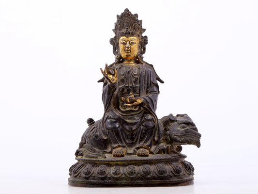 A serene gilt bronze Guanyin statue