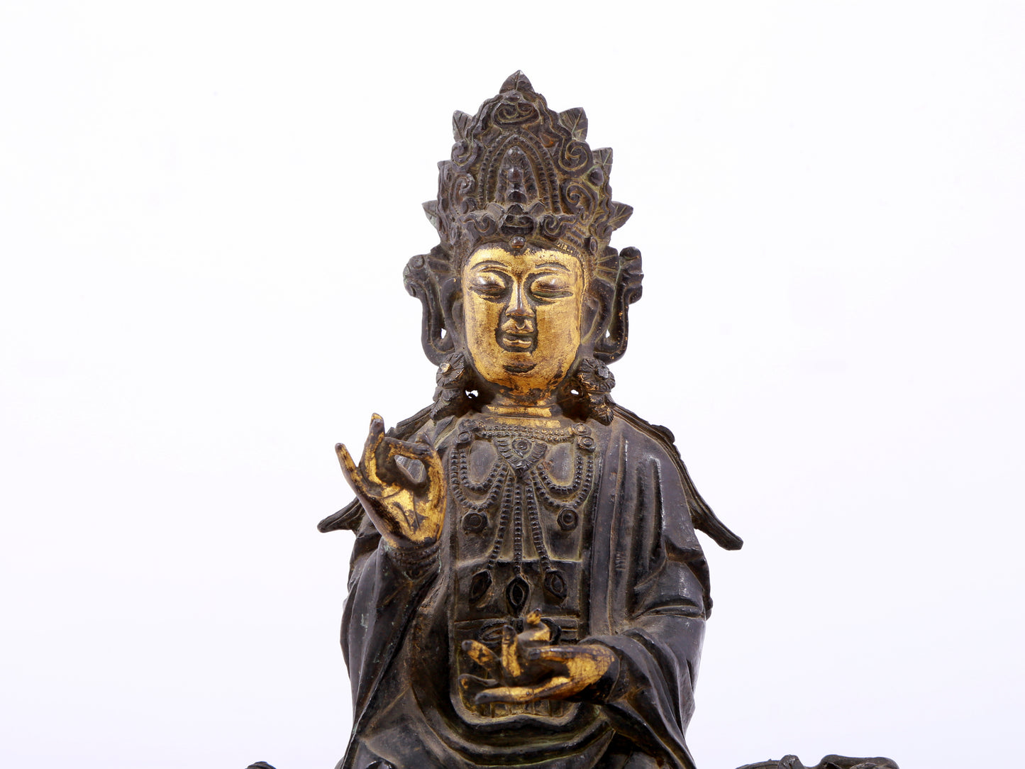 A serene gilt bronze Guanyin statue