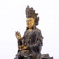 A serene gilt bronze Guanyin statue