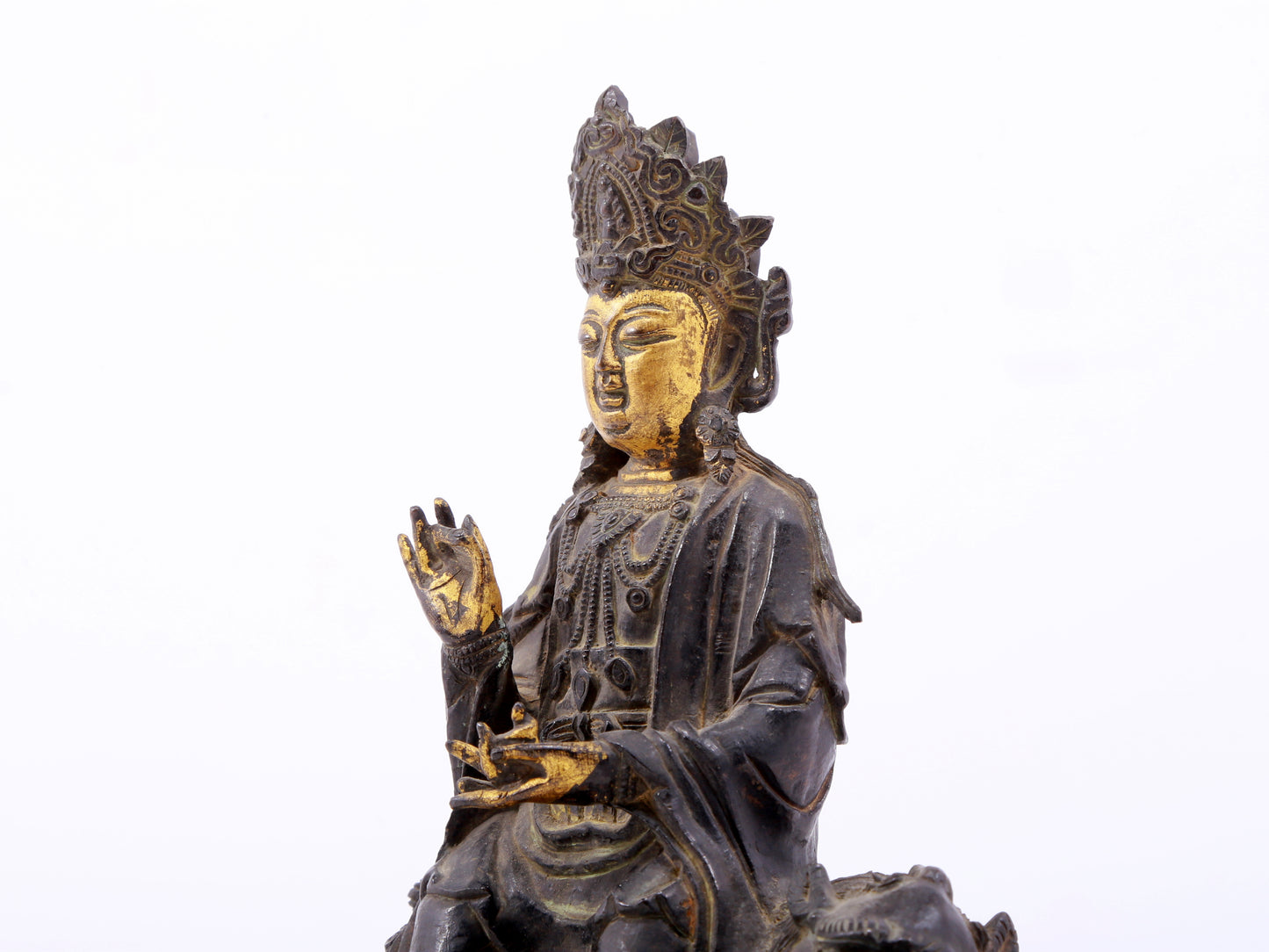 A serene gilt bronze Guanyin statue