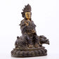 A serene gilt bronze Guanyin statue