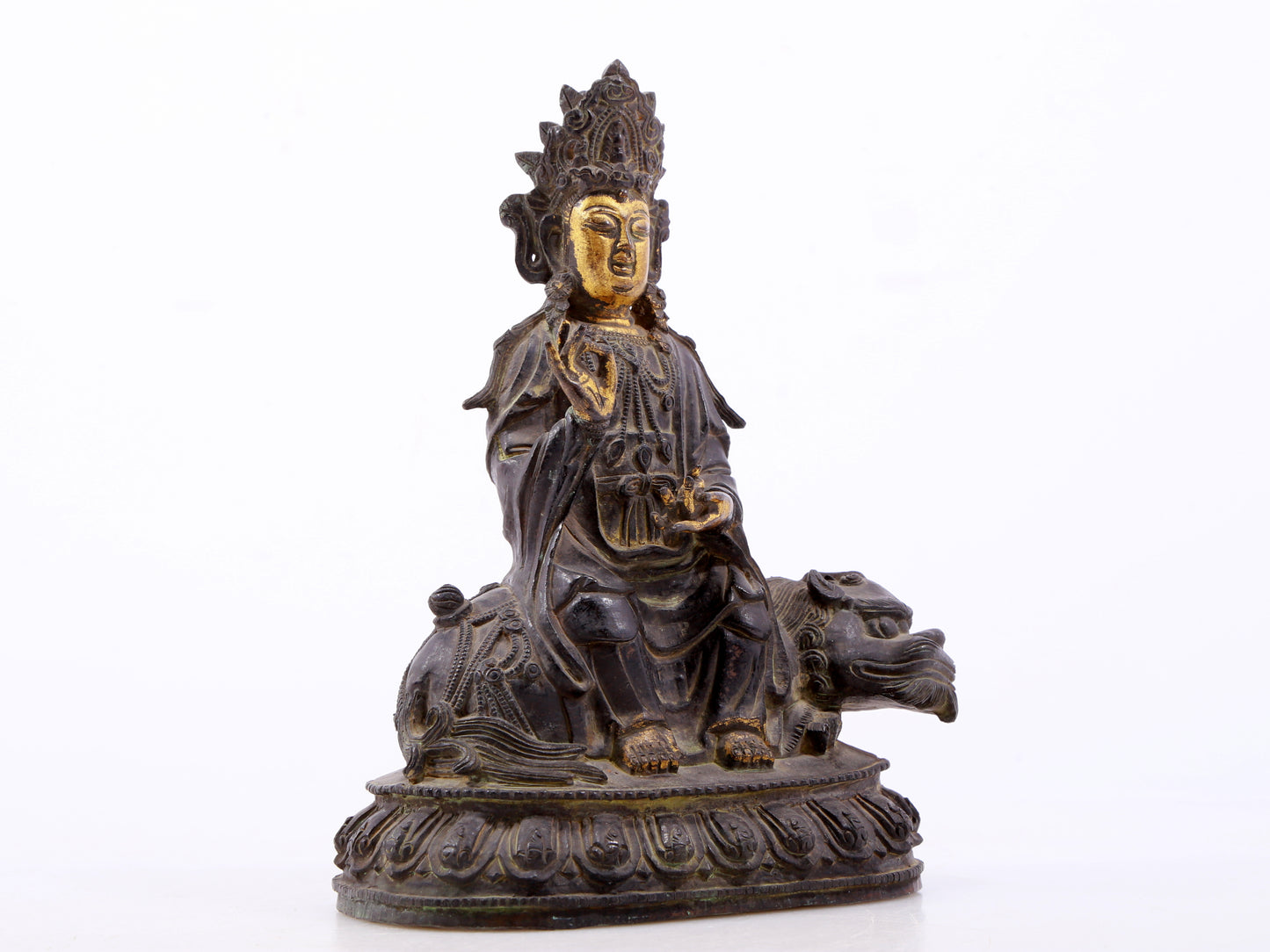 A serene gilt bronze Guanyin statue