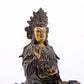 A serene gilt bronze Guanyin statue