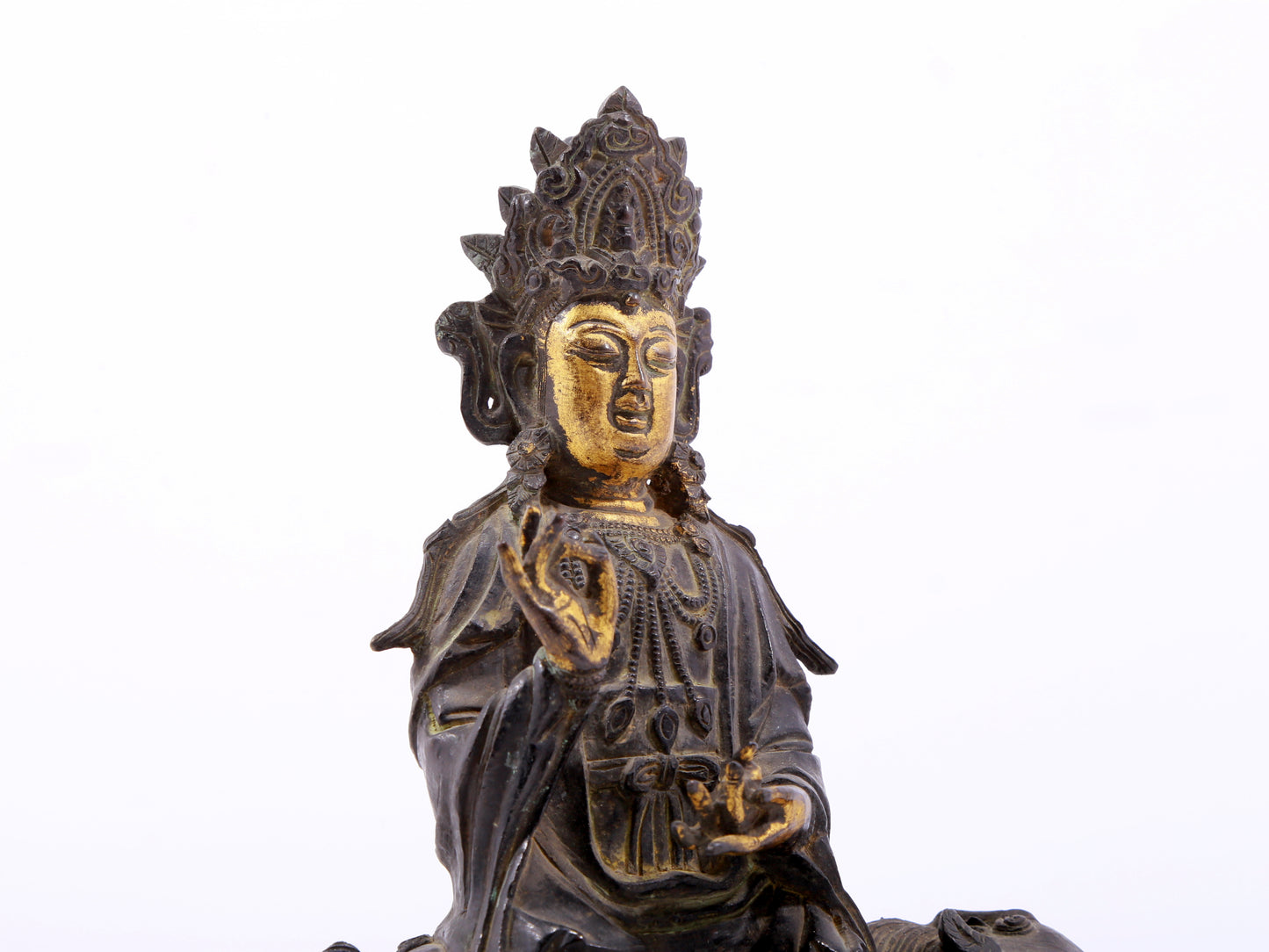 A serene gilt bronze Guanyin statue