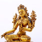 A serene gilt bronze green Tara statue