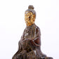 A serene gilt bronze figure