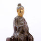 A serene gilt bronze figure