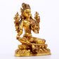 A serene gilt bronze green Tara statue