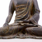 A serene gilt bronze statue of Gautama Buddha