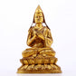 A serene gilt bronze statue of Tsongkhapa