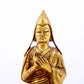 A serene gilt bronze statue of Tsongkhapa