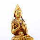 A serene gilt bronze statue of Tsongkhapa