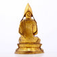 A serene gilt bronze statue of Tsongkhapa