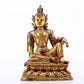 A serene gilt bronze statue of Guanyin