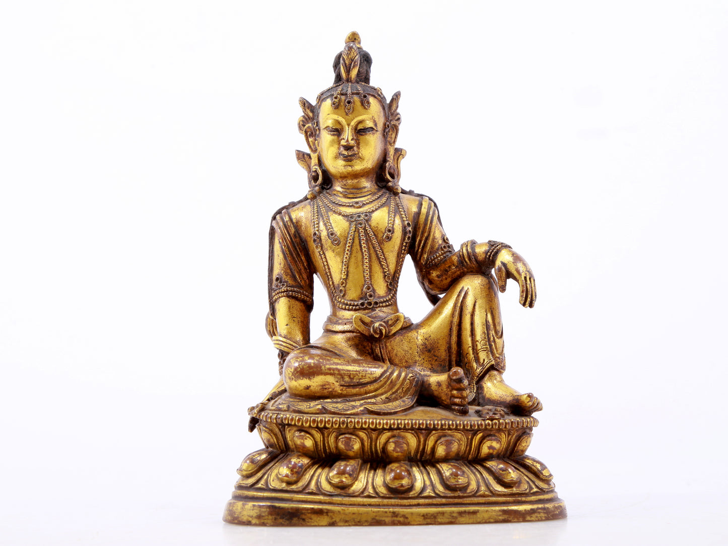 A serene gilt bronze statue of Guanyin