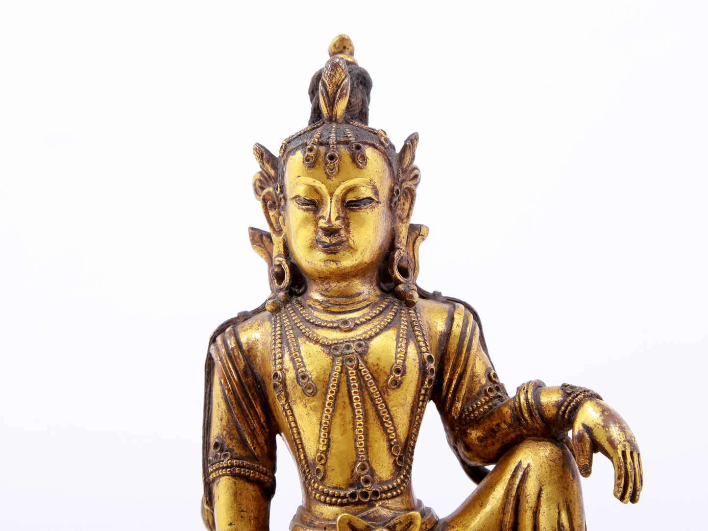 A serene gilt bronze statue of Guanyin