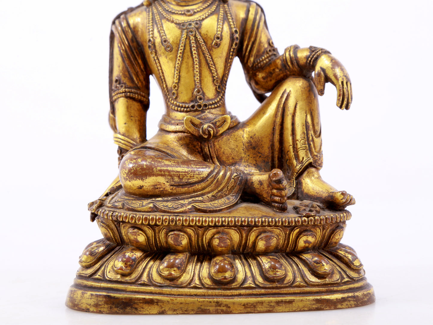 A serene gilt bronze statue of Guanyin