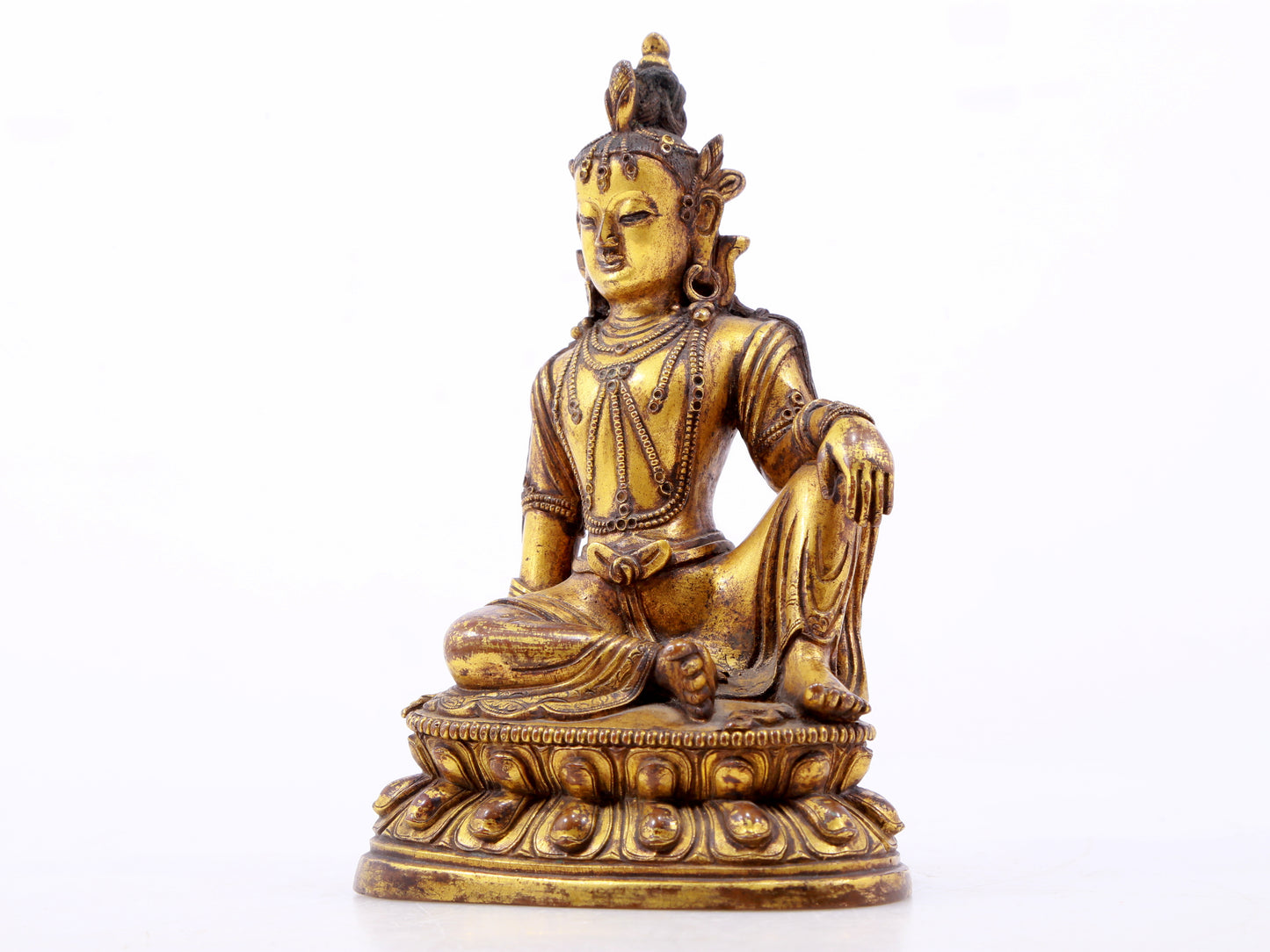 A serene gilt bronze statue of Guanyin