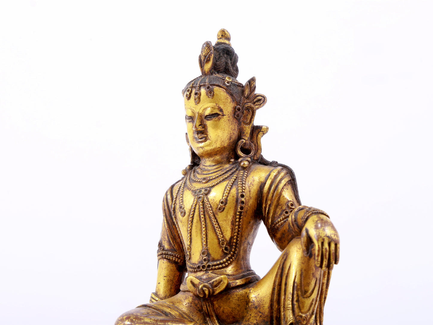 A serene gilt bronze statue of Guanyin