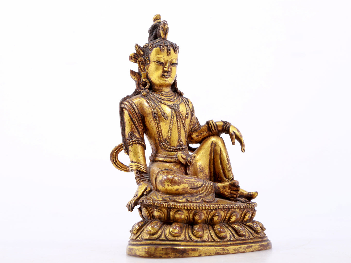 A serene gilt bronze statue of Guanyin