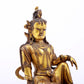 A serene gilt bronze statue of Guanyin