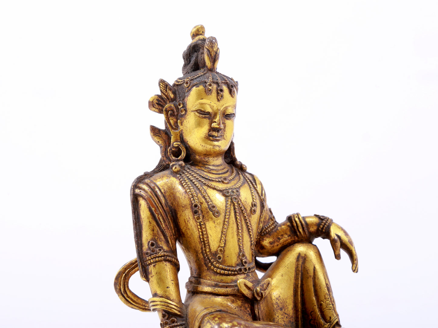 A serene gilt bronze statue of Guanyin