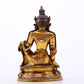 A serene gilt bronze statue of Guanyin