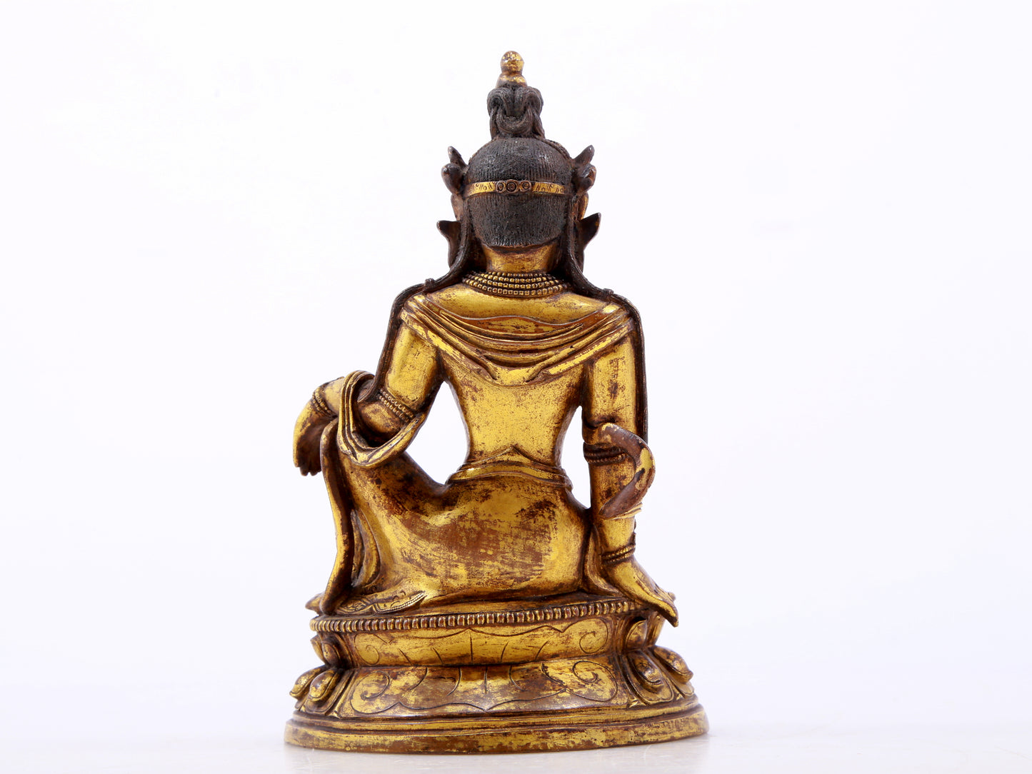 A serene gilt bronze statue of Guanyin