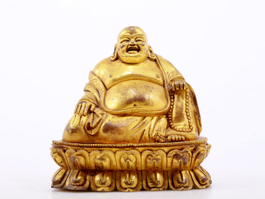 A serene gilt bronze Maitreya statue